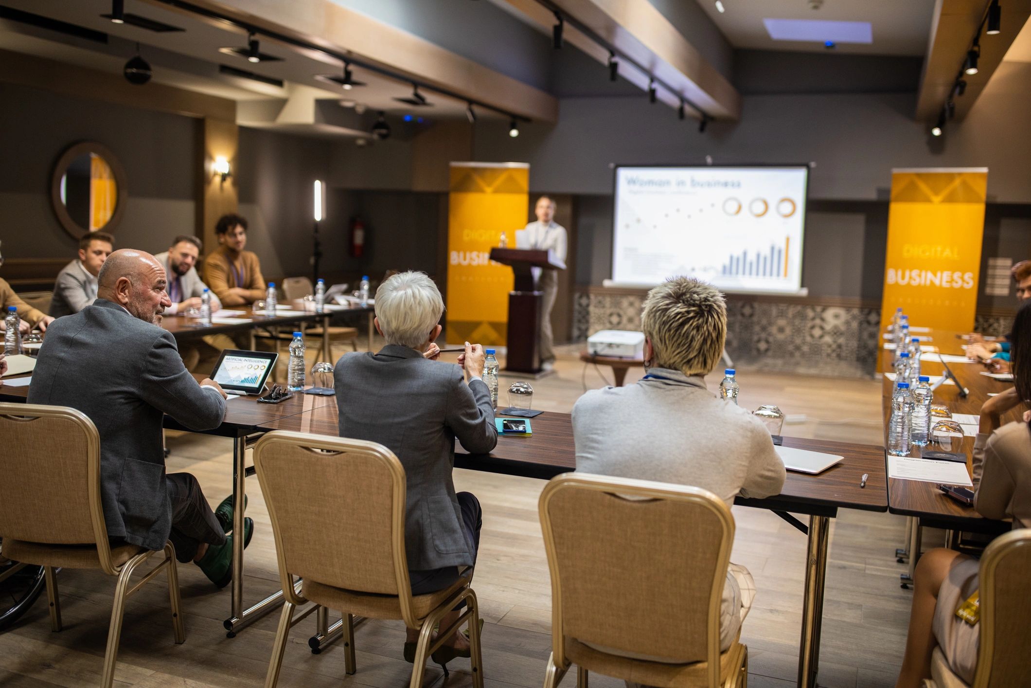 Conference audience during a live presentation