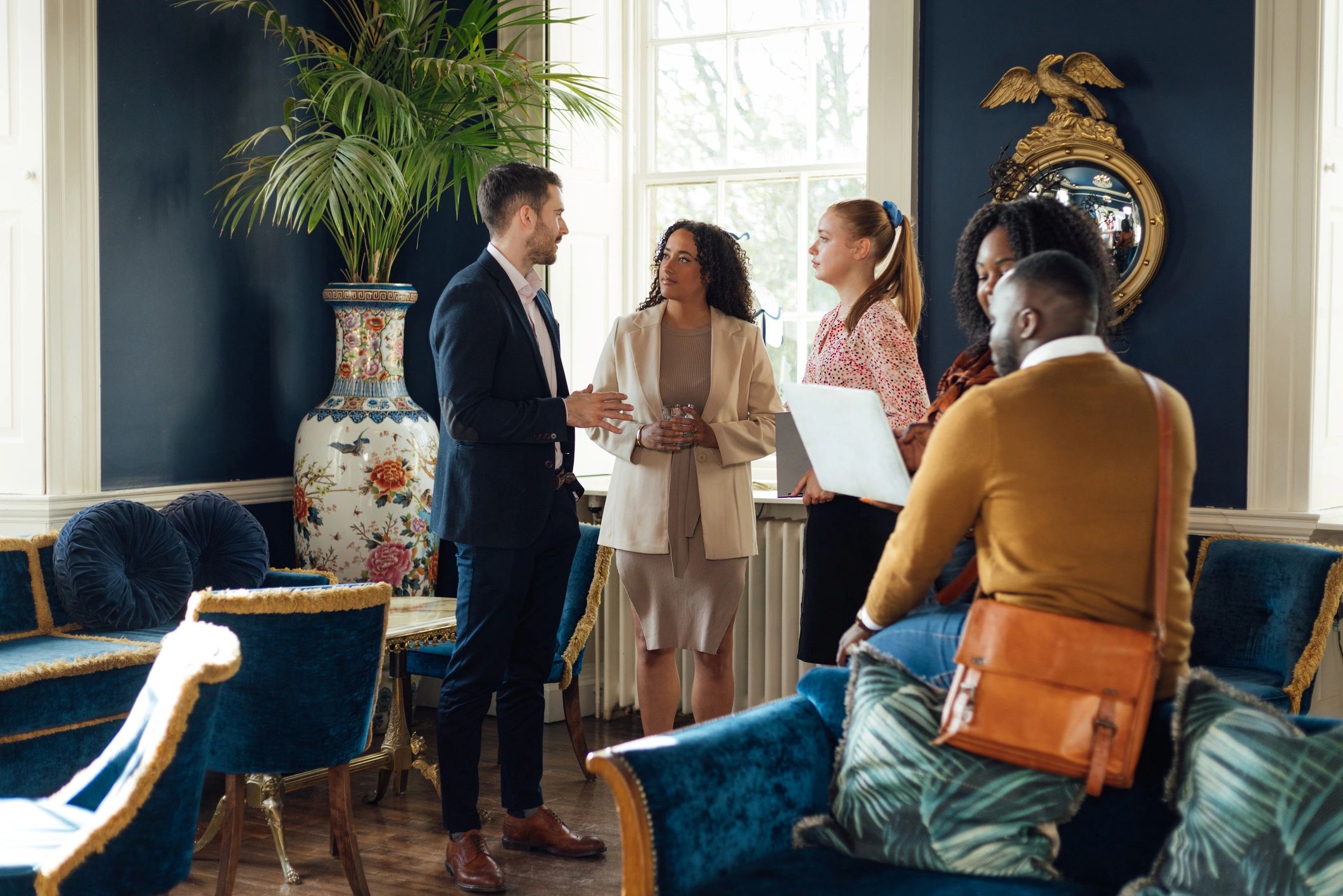 Professionals networking at a corporate event