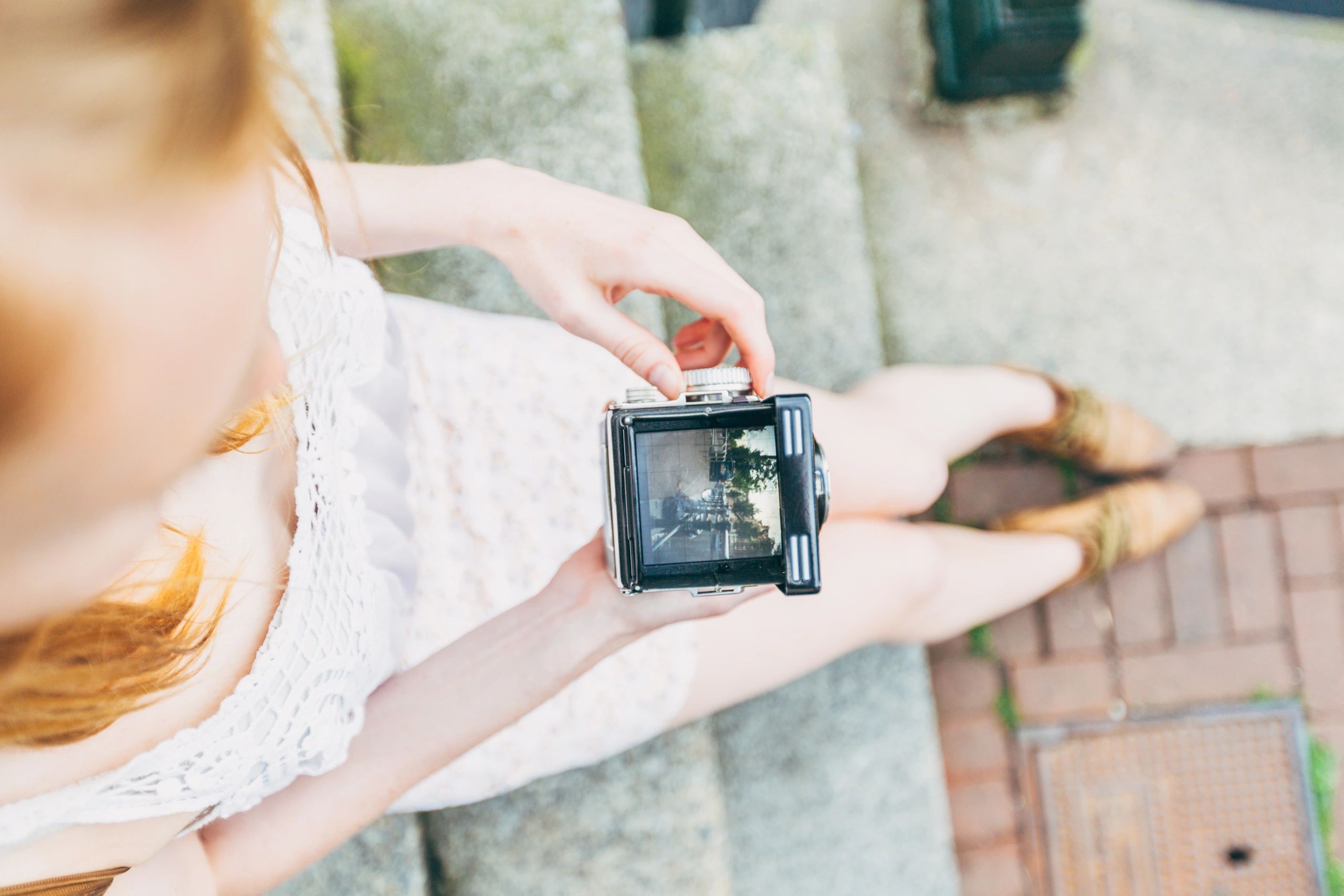 Professional photographer with camera preparing to capture an event